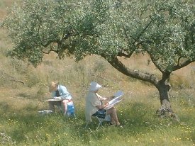 painters practicing painting under olive trees