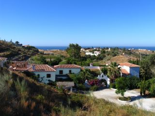 View of Finca with the sea behind View of Finca towards the meditarreanien sea and beach of Costa del Sol